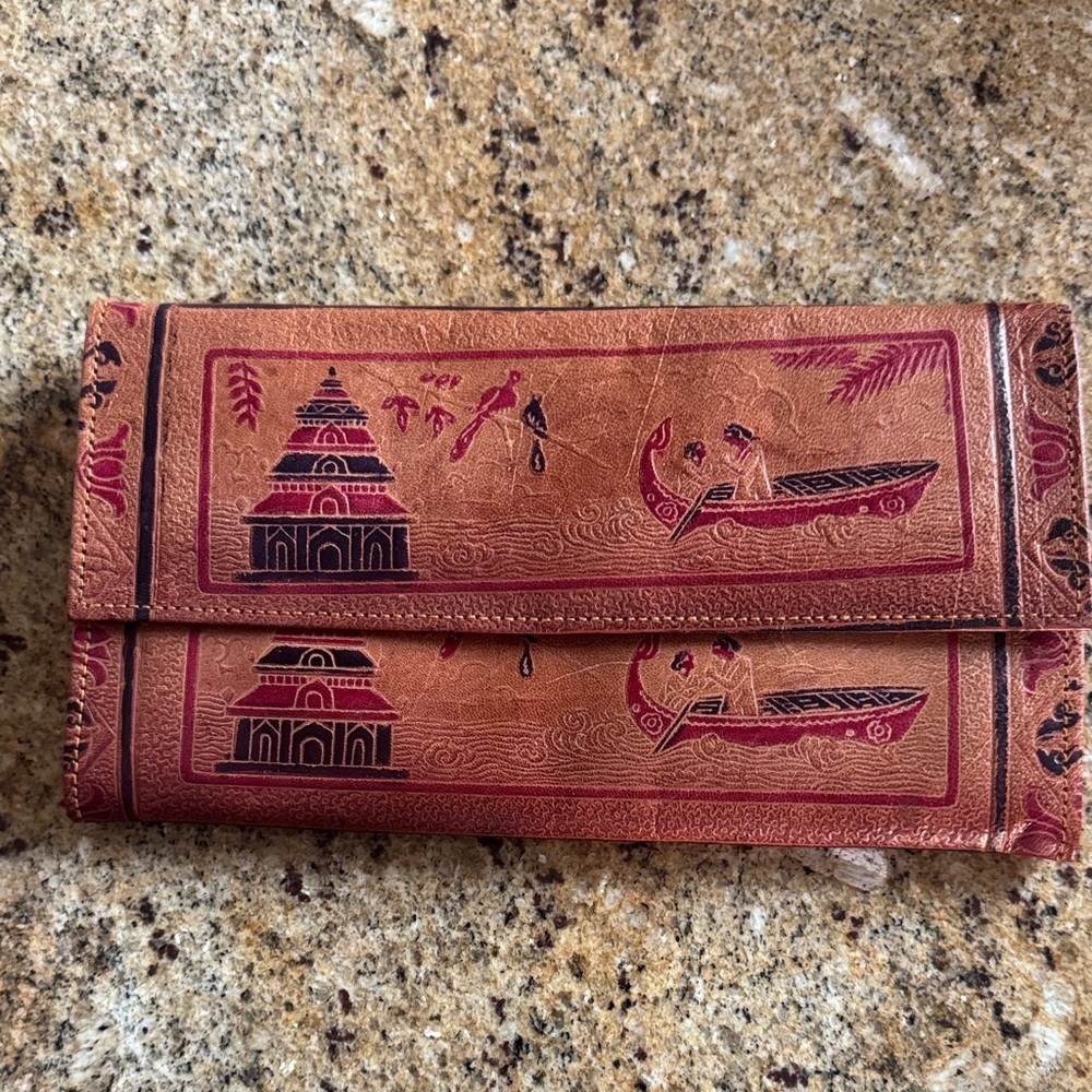 Leather Indonesian embossed scenery snap flap multi-pocket clutch. New.